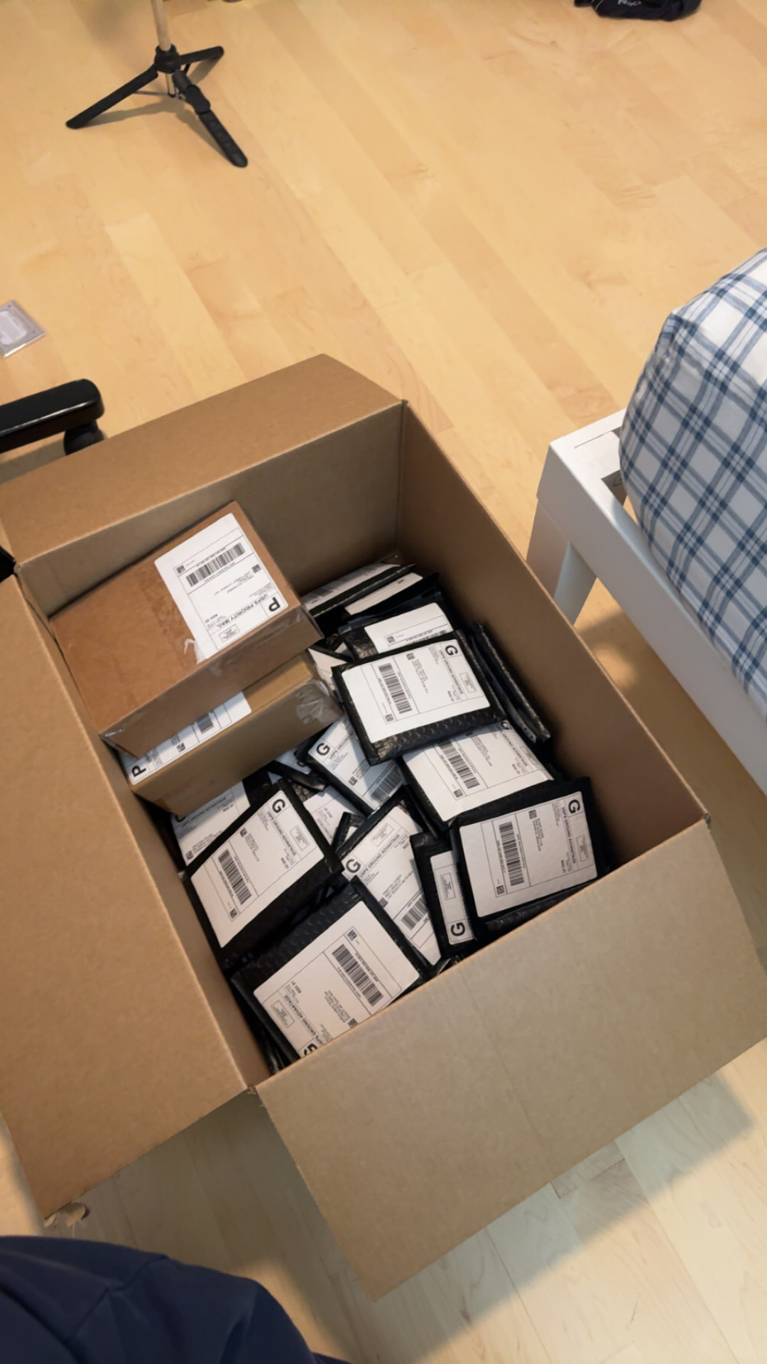Box full of packaged card orders